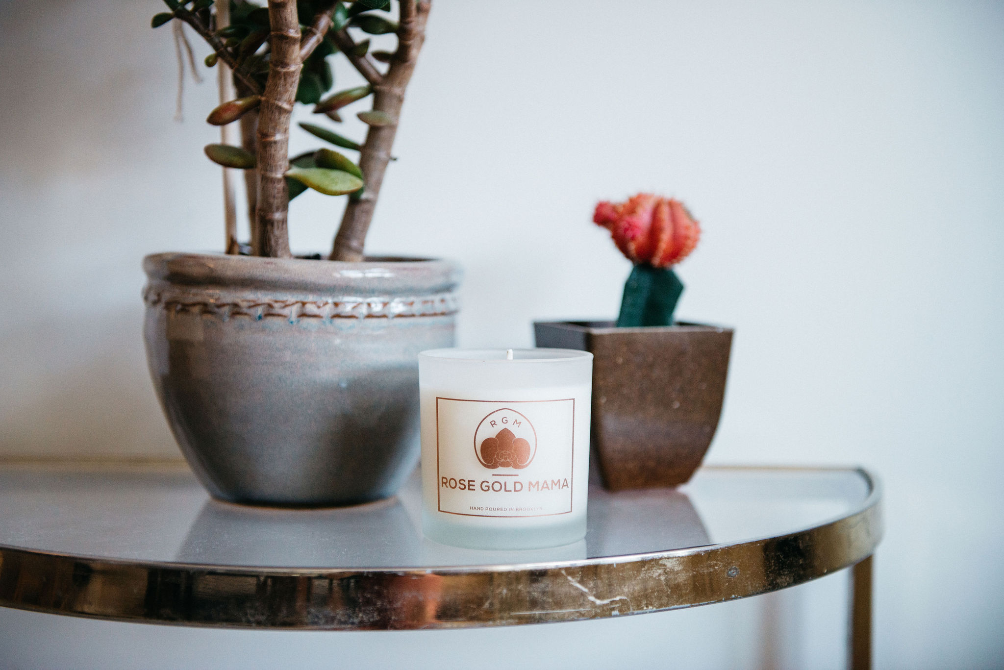 Rose Gold Mama Candle On Table